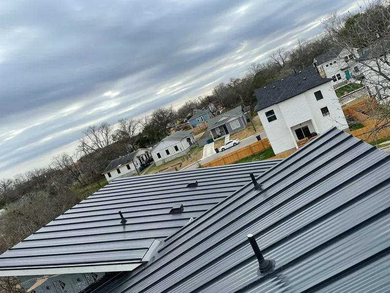 Standing seam metal roof panels with vents for Skylight Repair in Dalton
